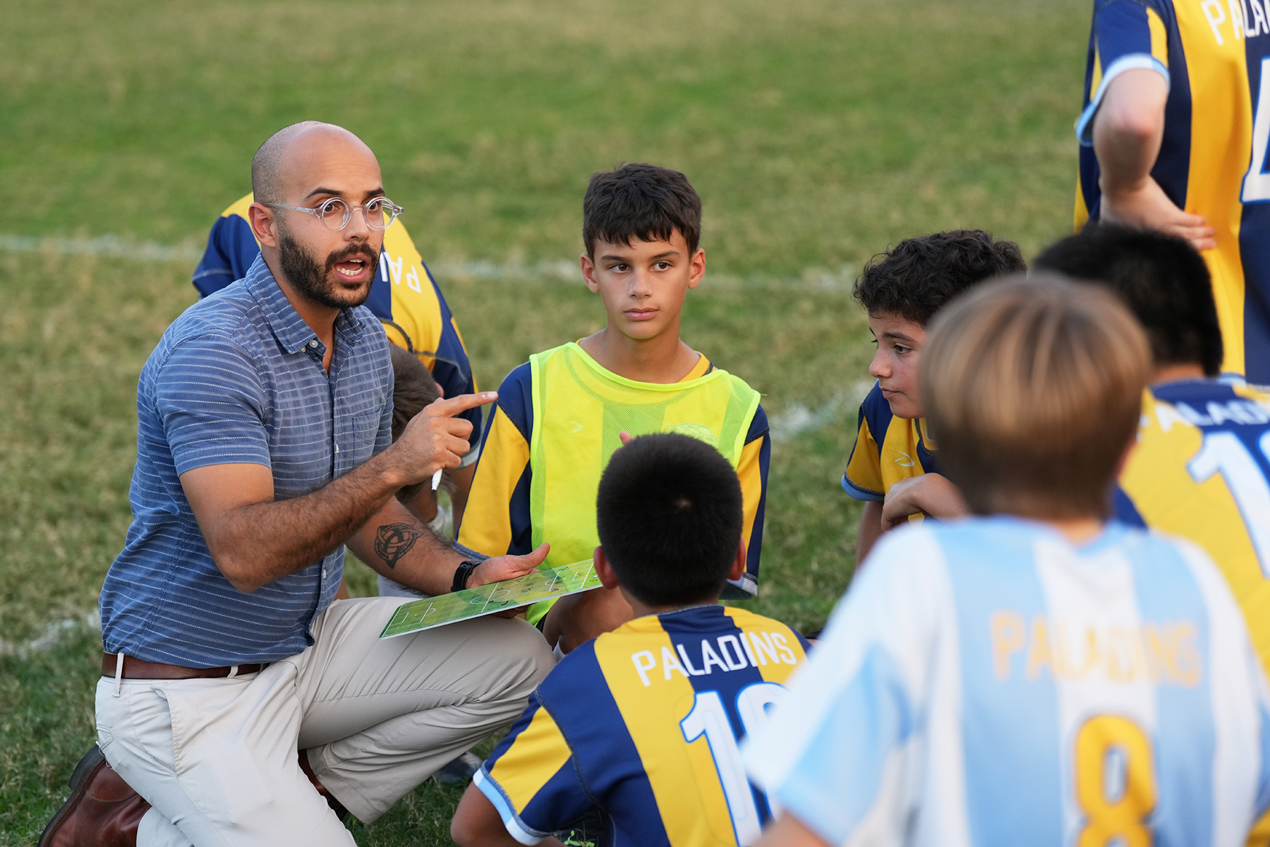 Providence Classical School Soccer coach speaking to players